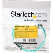 Picture of StarTech.com 1m (3ft) LC/UPC to LC/UPC OM3 Multimode Fiber Optic Cable, Full Duplex 50/125µm Zipcord Fiber Cable, 100G, Low Insertion Loss, LSZH Fiber Jumper Cord