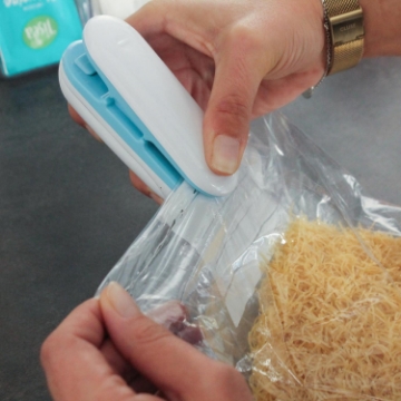 Show details for Genius Ideas Easy Bag Sealer Picture of Genius Ideas Easy Bag Sealer