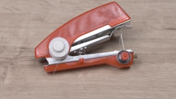 Show details for Genius Ideas Mini Hand Sewing Machine Picture of Genius Ideas Mini Hand Sewing Machine