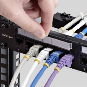 Picture of StarTech.com 24 Port 1U Feed Through Patch Panel with Cable Management Bar, Rackmount Cat6 Ethernet Patch Panel with RJ45 UTP Inline Couplers